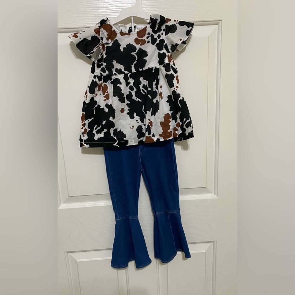 Cow Print Top with Blue Flared Jeans